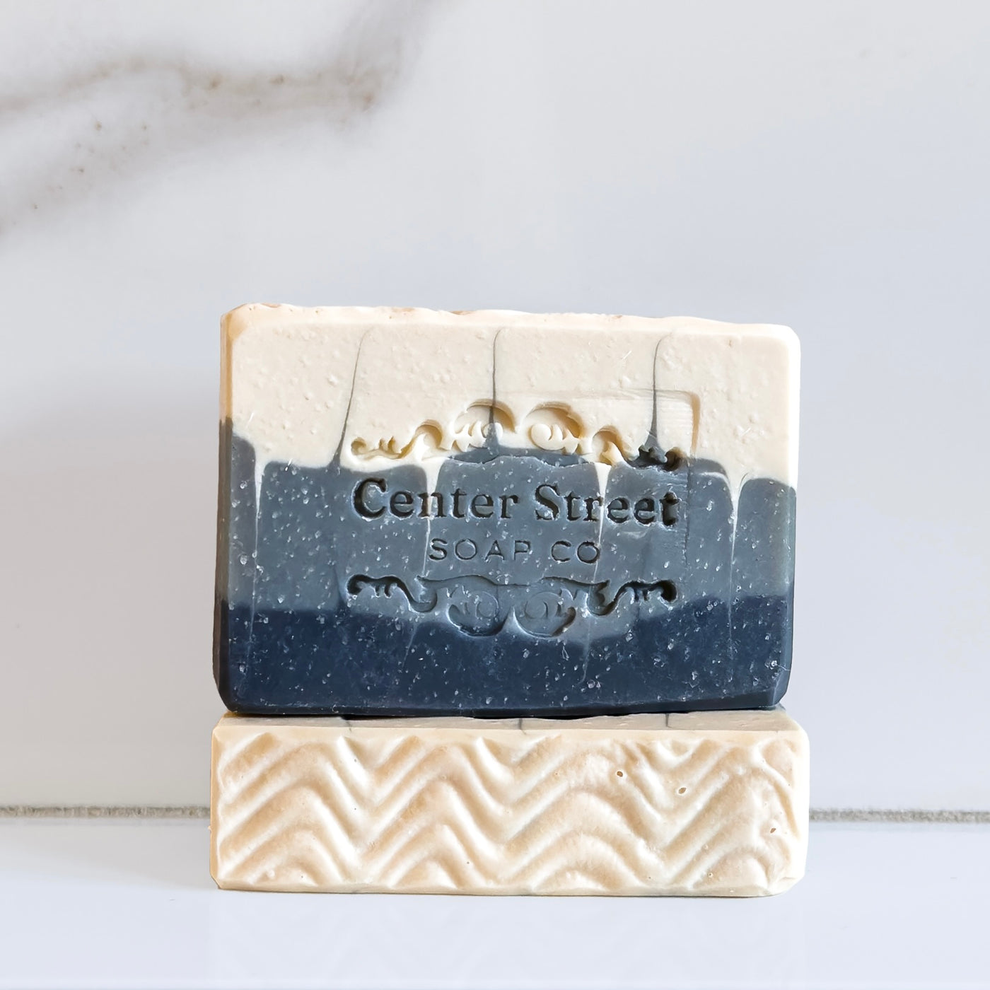 Handcrafted 'Perfect Man' soap bar with white, gray, and black swirls